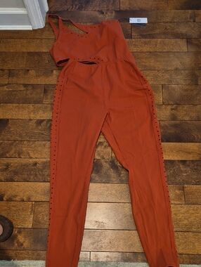 GIGI C One-Shoulder Cutout Jumpsuit in Rust